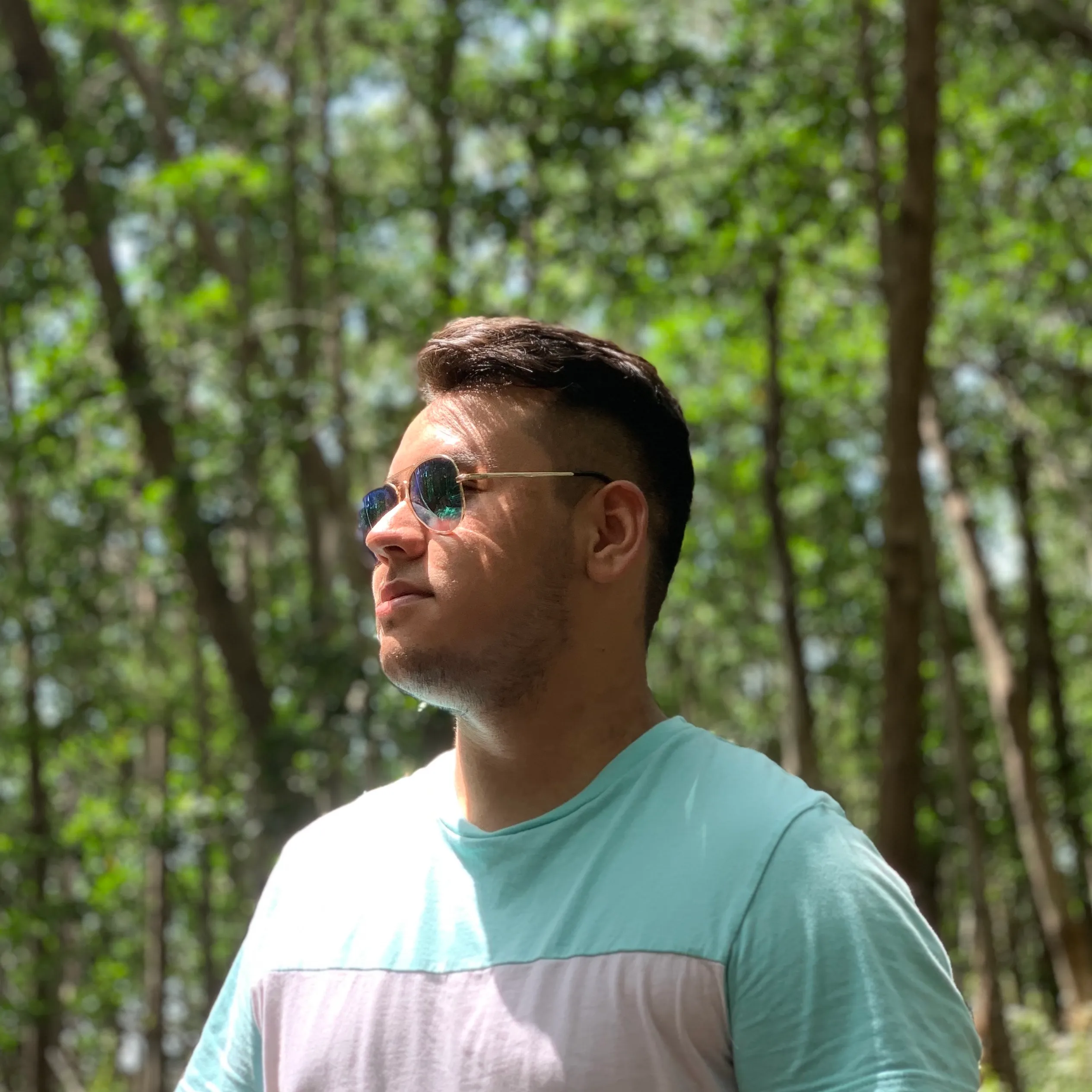 Fernando de la Rosa outdoors, wearing sunglasses